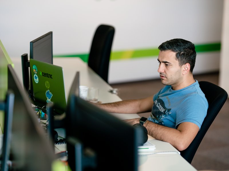 software tester working on computer