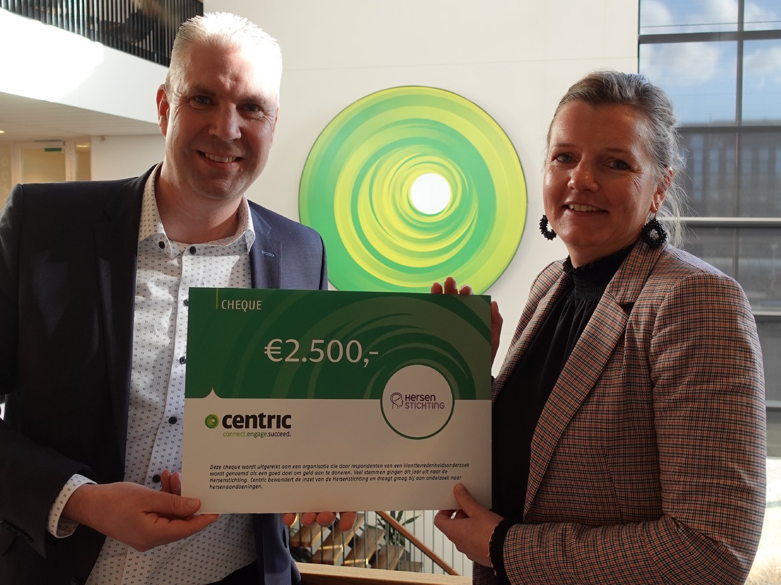 Donatie Centric PSS aan Hersenstichting