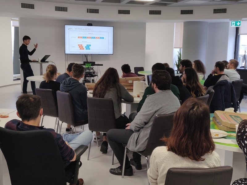 Software developer giving a company presentation
