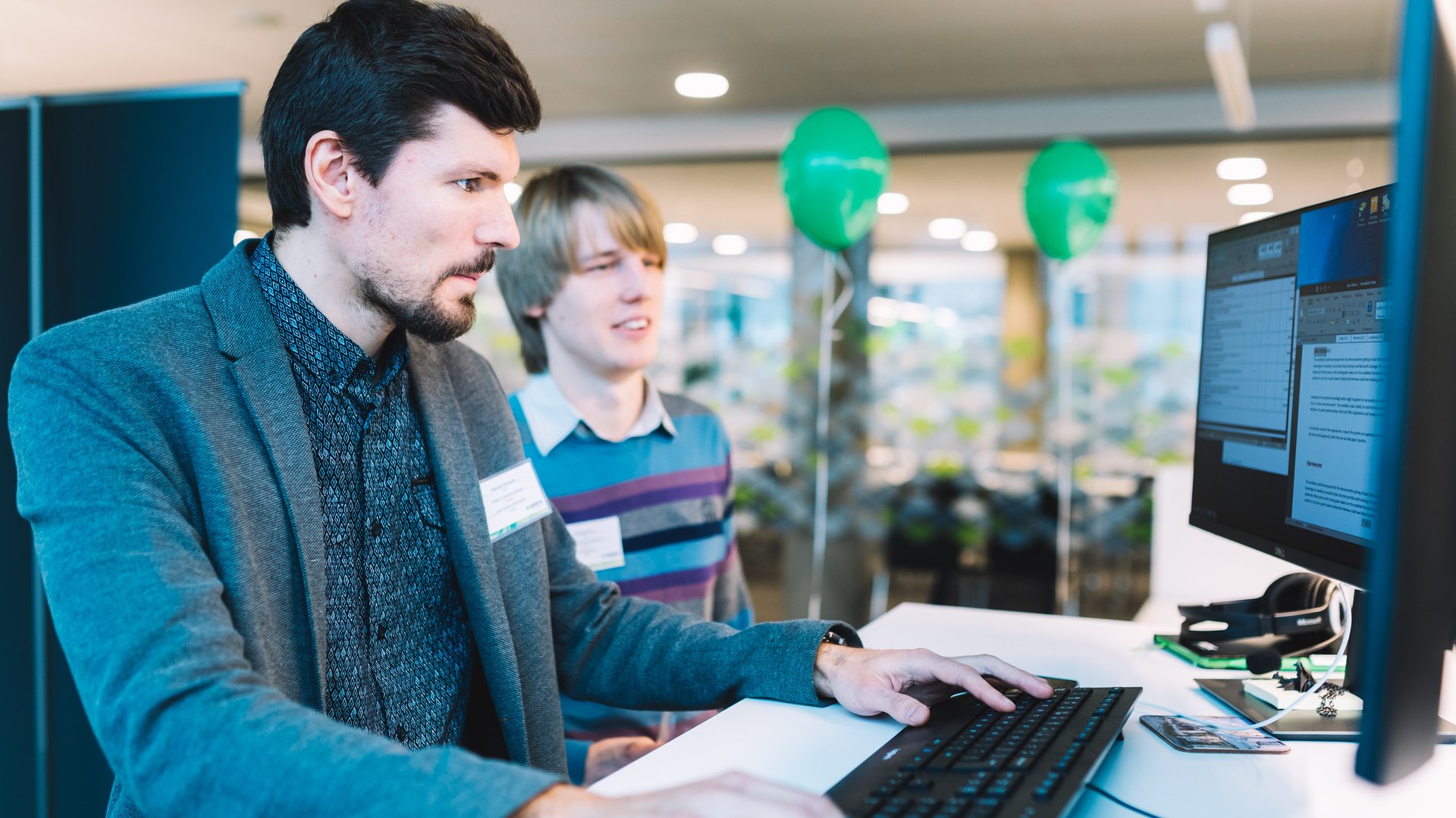 Centric Developers Working at a Computer