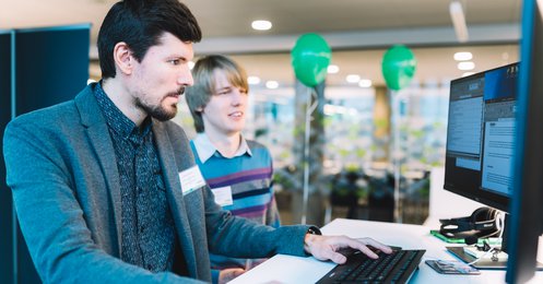 Centric Developers Working at a Computer