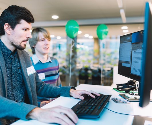 Centric Developers Working at a Computer