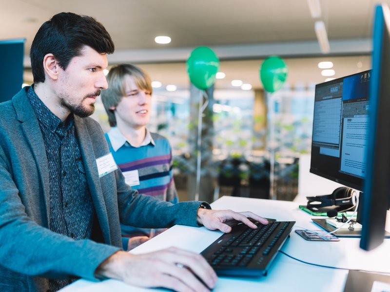 Centric Developers Working at a Computer