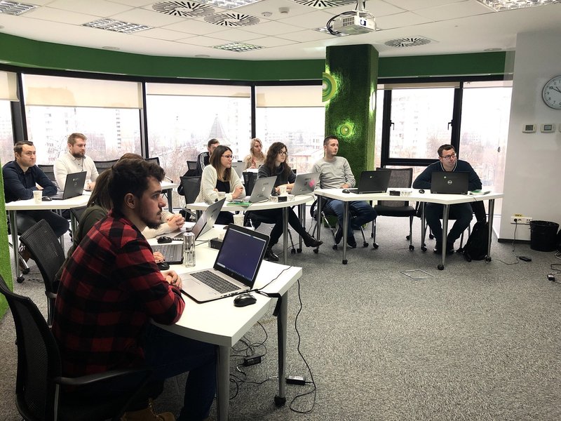 Front end developers and full stack developers working during a training