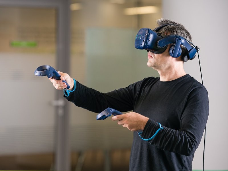 XR developer using a hololens to develop a AR VR application
