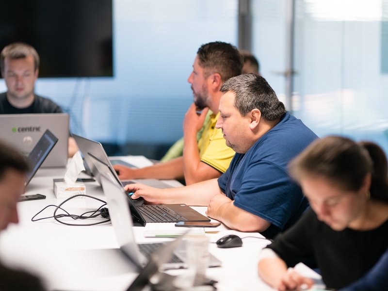 Front end developers and full stack developers working during a training