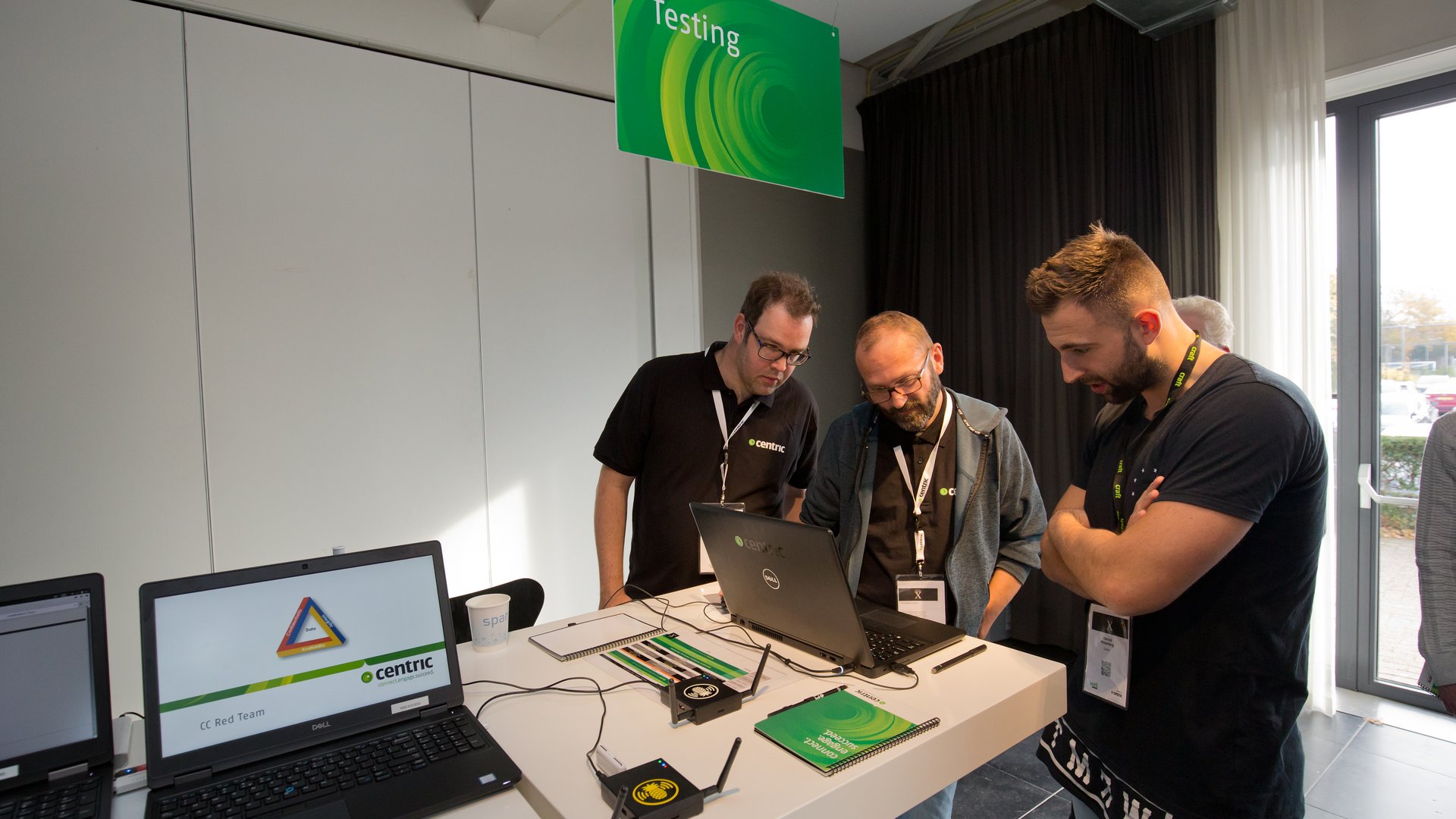 Testers at a laptop
