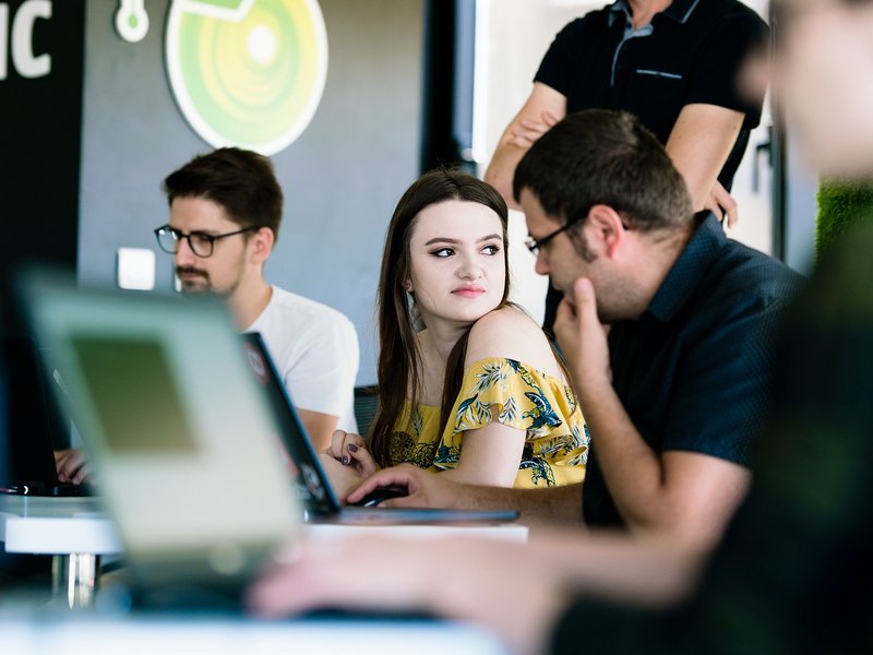 Front end developers and full stack developers working during a training