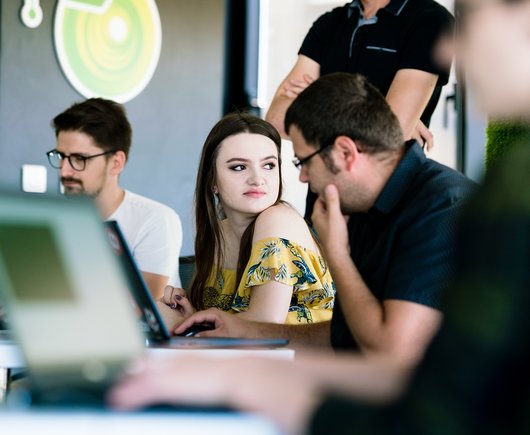 Front end developers and full stack developers working during a training