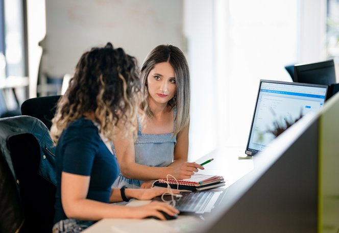 Centric developer tester product owner discussing a project